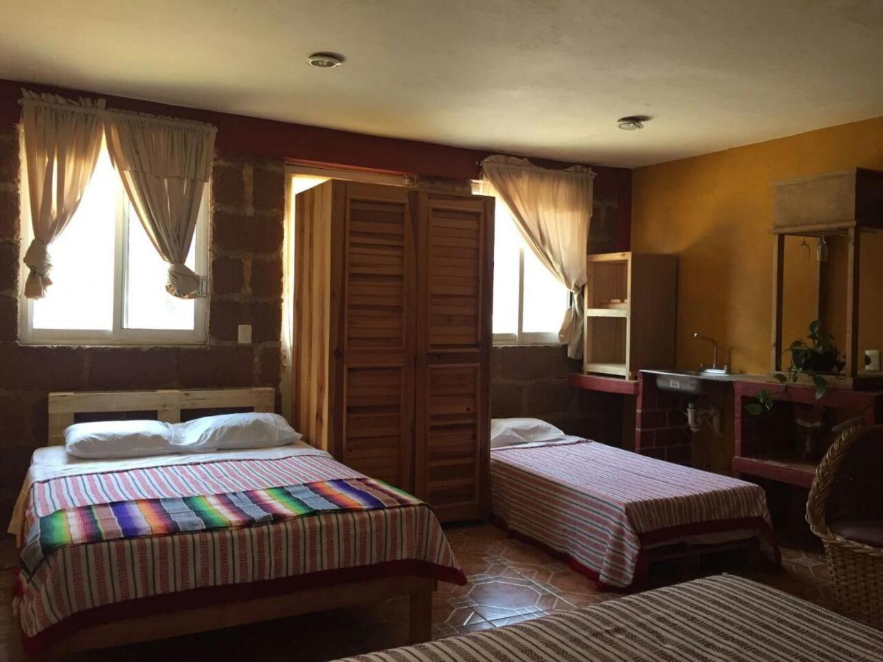 Hotel Las Fumarolas De Don Goyo Чолула Экстерьер фото